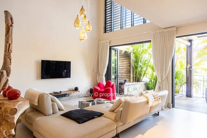 Beautiful duplex with private dock for sale in the Marina of Rivière Noire, Mauritius.
