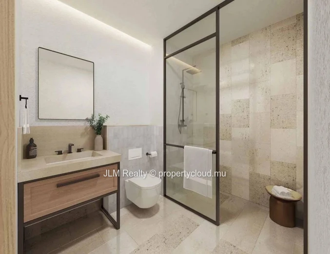 Superbe penthouse à vendre dans une résidence pieds dans l’eau avec vue sur le Morne Brabant situé à Rivière Noire, Î...