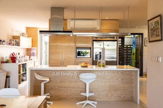 Beautiful duplex with private dock for sale in the Marina of Rivière Noire, Mauritius.