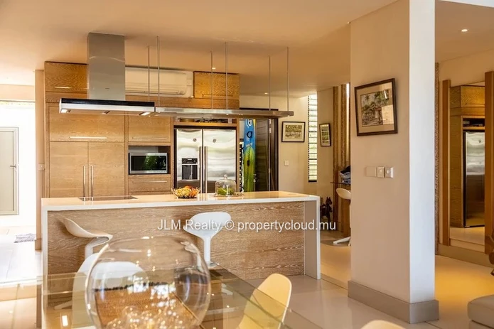 Beautiful duplex with private dock for sale in the Marina of Rivière Noire, Mauritius.