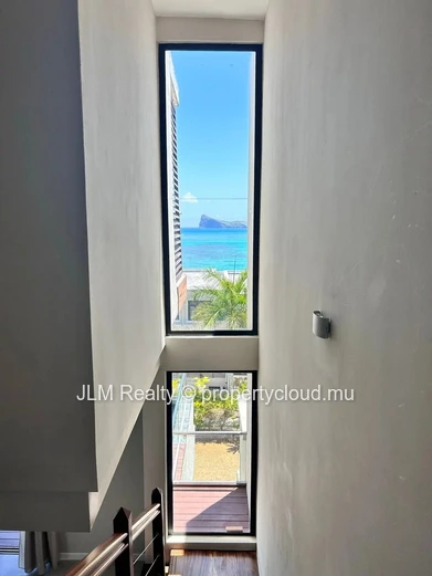 For Sale – Exceptional Beachfront Duplex in Bain Boeuf, Mauritius, with Panoramic Views of the Northern Islands